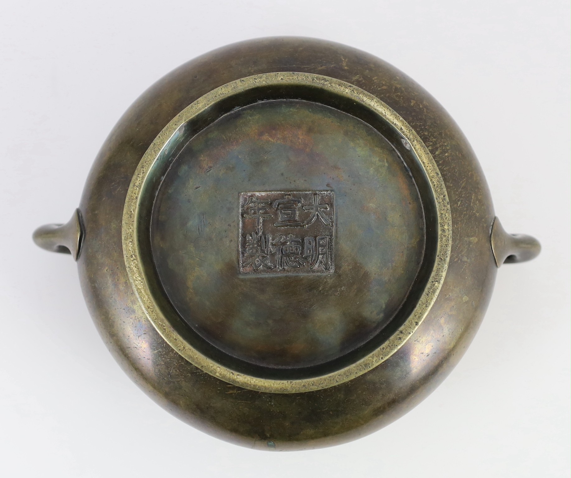 A Chinese bronze gui censer, Xuande six character mark but 19th century, 22cm across, the rim 14.2cm diameter